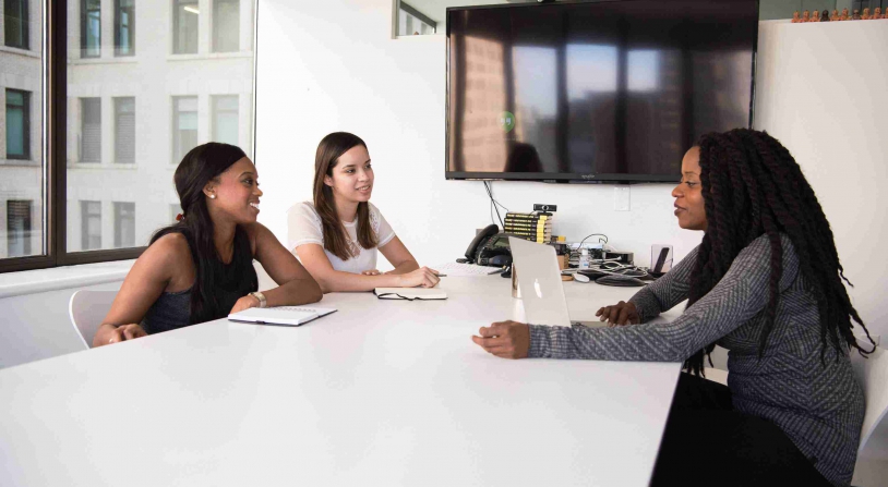 women in the public relations industry interview a potential employee
