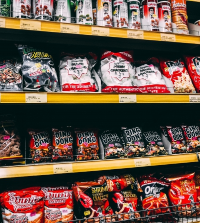 international snacks on shelf at grocery store