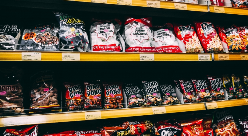 international snacks on shelf at grocery store