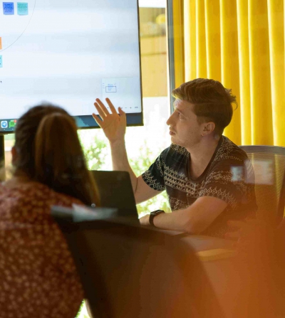 interns working at a computer