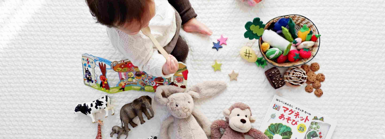 child playing with educational toys