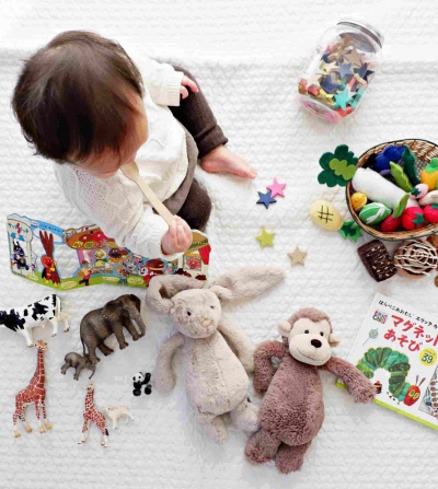 child playing with educational toys