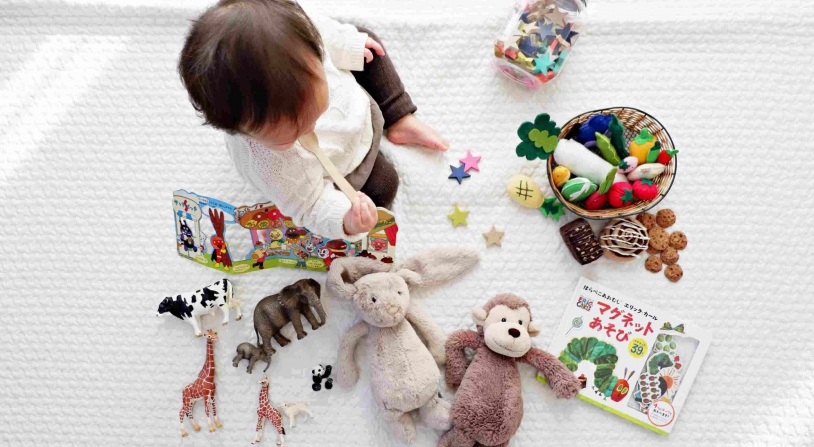 child playing with educational toys