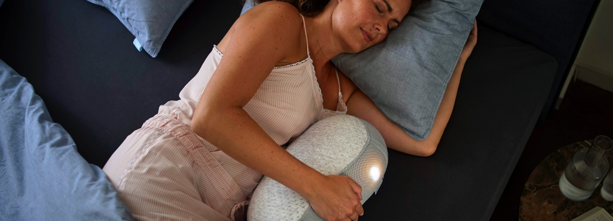 woman sleeping with sleep technology