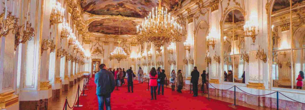 people standing on a red carpet