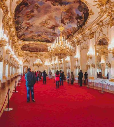 people standing on a red carpet