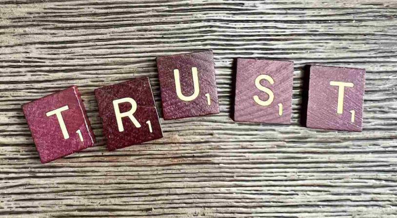 trust spelled out in scrabble letters